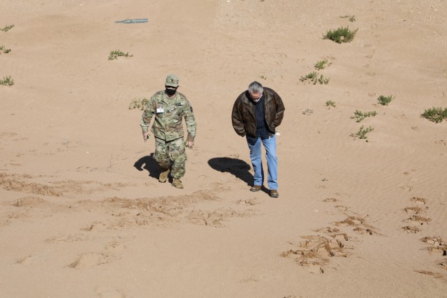 Master Sgt. Joshua Heaton, Georgia Army National Guard, and Scott McWhorter, Southern European Task Force, Africa, survey a small arms firing range in Morocco Jan. 20, 2021. Heaton and McWhorter joined two dozen U.S. military planners in Morocco to establish plans for the African Lion 21 exercise, scheduled for June. African Lion, U.S. Africa Command's largest exercise, has increased interoperability among U.S. partners and Allies since 2003. Plans for AL21 involve more than 10,000 troops from the United States, Morocco, Tunisia, Senegal and elsewhere. The global COVID-19 pandemic curtailed the previous year's exercise. Plans for AL21 include COVID-19 mitigations and flexible options to ensure maximum participation and value for participating countries. (U.S. Army photo by Maj. Cain S. Claxton/Southern European Task Force, Africa)