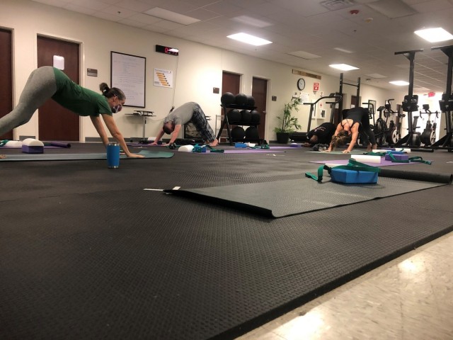 Soldiers assigned to the Fort Bragg Soldier Recovery Unit, N.C., attended a new yoga class at the adaptive reconditioning program gym on Dec. 4, 2020. (U.S. Army photo courtesy Dean Bissey)