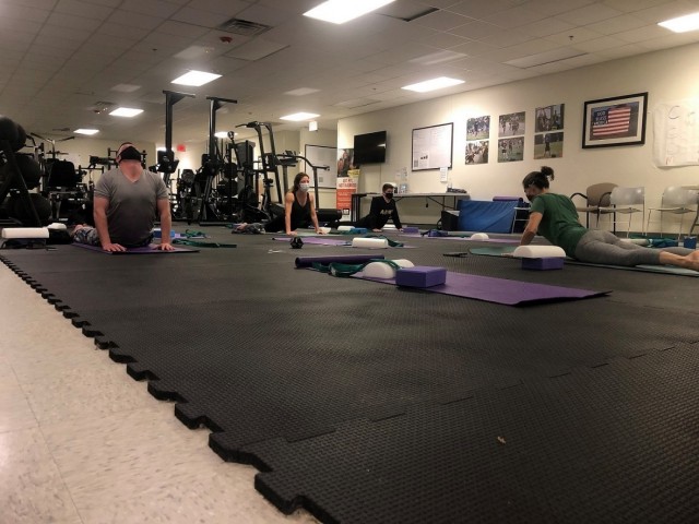 On Dec. 4, 2020, Soldiers assigned to the Fort Bragg Soldier Recovery Unit, N.C., attended a new yoga class at the adaptive reconditioning program gym. (U.S. Army photo courtesy Dean Bissey)