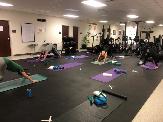 Soldiers assigned to the Fort Bragg Soldier Recovery Unit, N.C., participated in a new yoga class at the adaptive reconditioning program gym on Dec. 4, 2020. (U.S. Army photo courtesy Dean Bissey)