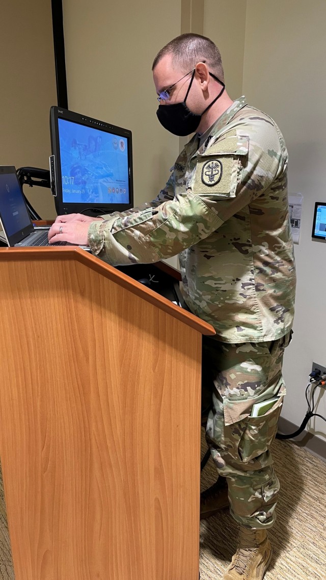 Martin Army Community Hospital&#39;s Nurse Method Analyst Capt. Ben Stone works out technology glitches ahead of the Army Nurse Corps&#39; 120th Anniversary celebration on February 2.