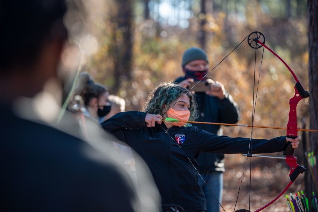 Mady Holmes, 12, aims at a target during Beginners’ Archery, Jan 23.