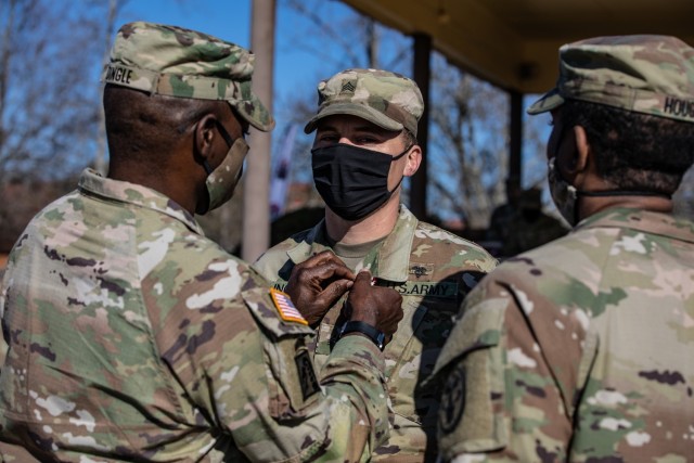 U.S. Army Sgt. Tyrel Trainor of the 4th Infantry Division, is awarded the Meritorious Service Medal for finishing in 1st place during the 2021 Command Sgt. Maj. Jack L. Clark, Jr. U.S. Army Best Medic Competition (ABMC) on Fort Gordon, Ga., Jan....