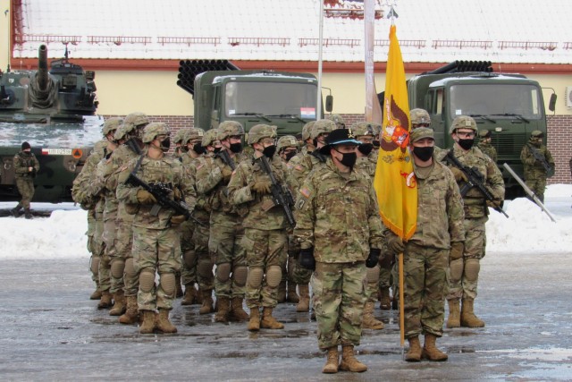 Soldiers from incoming U.S. Army 1st Squadron, 2d Cavalry Regiment stand on the parade field during the enhanced Forward Presence Battle Group Poland Change of Command Ceremony Jan.28, 2021, at Bemowo Piskie Training Area, Poland. (Photo courtesy of eFP BGP PAO)