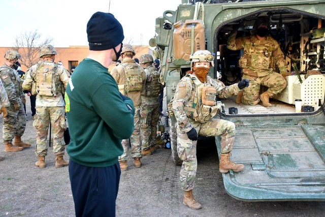 3d Cavalry Regiment Commander, Col. Kevin Bradley, observes as Sgt. Eve Miller, a 13F Forward Observer with 2nd Squadron Fire Support Team discusses digital capabilities during a Fires Demonstration on January 28 at Fort Hood. (U.S. Army photo by Maj. Marion Jo Nederhoed)