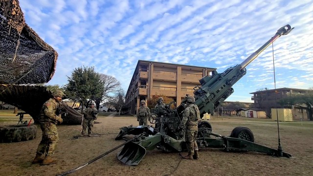3d Cavalry Regiment Field Artillery Squadron Troopers demonstrate the job of a 13B Canon Crew Member during a fire mission. The training took place during a Fires Demonstration on January 28 at Fort Hood.  (U.S. Army photo by Maj. Marion Jo Nederhoed)