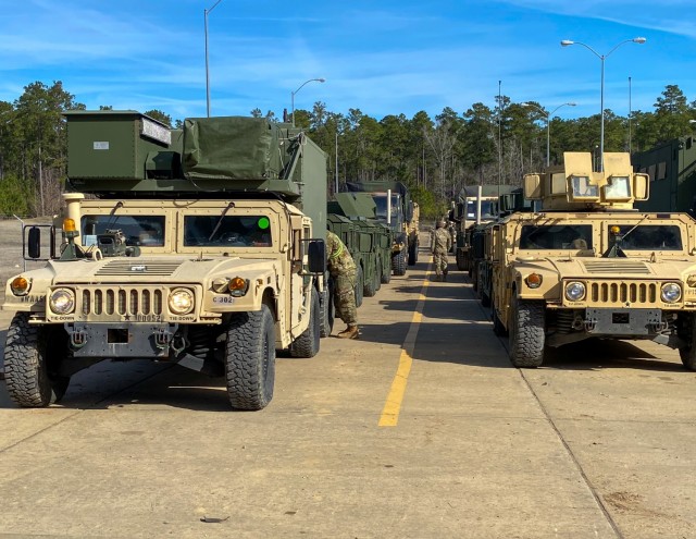 Paratroopers assigned to the 3rd Brigade Combat Team, 82nd Airborne Division wait to install Multiple Integrated Laser Engagement System (MILES) prior rotation 21-04 at the Joint Readiness Training Center on Fort Polk, La, January 28, 2021. The rotation serves to enhance the brigade and their supporting unit's deployment readiness since the assumption of responsibility as the Army's Immediate Response Force in December 2020.