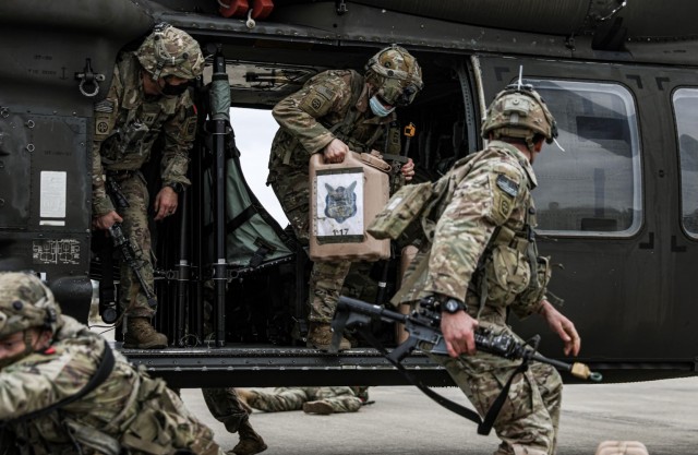 Paratroopers assigned to the 3rd Brigade Combat Team, 82nd Airborne Division participate in cold load training with the 82nd Combat Aviation Brigade at the Joint Readiness Training Center on Fort Polk, La., Jan. 30, 2021. The rotation serves to enhance the brigade and their supporting unit&#39;s deployment readiness since the assumption of responsibility as the Army&#39;s Immediate Response Force in December 2020. (U.S. Army photo by Pfc. Vincent Levelev)