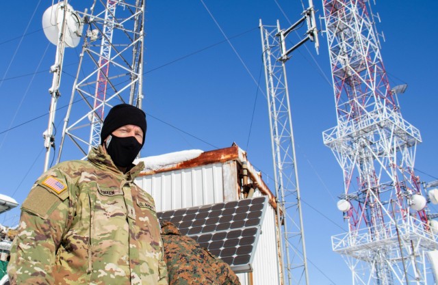 Chief Warrant Officer 2 John Finken, a contracting officer representative with Regional Command-East, Kosovo Force, inspects contractors performing maintenance during a radio systems inspection at Mount Golesh in Kosovo on Jan. 28, 2021. During...