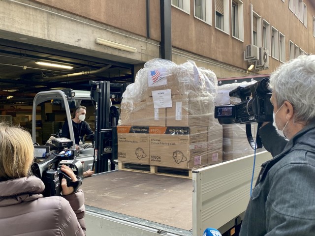 Italian media report on the delivery of U.S.-donated medical supplies behind San Bortolo hospital in Vicenza, Italy. (Photo by Rick Scavetta, U.S. Army Garrison Italy) 
