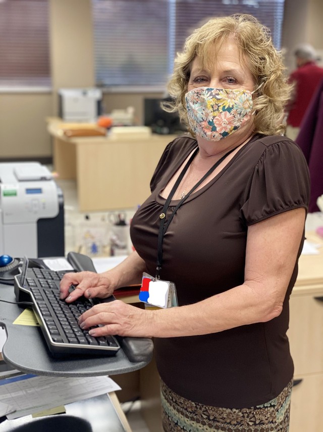 Sherlynn White, executive assistant, works in the Bayne-Jones Army Community Hospital Command suite Jan. 27.