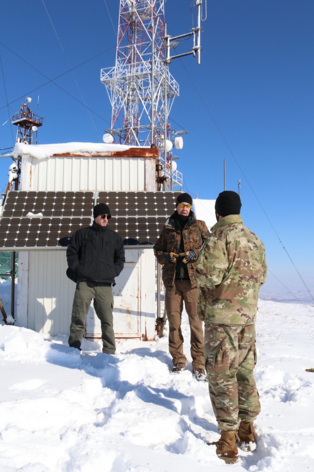 Chief Warrant Officer 2 John Finken, a contracting officer representative with Regional Command-East, Kosovo Force, talks to contractors performing maintenance during a radio systems inspection at Mount Golesh in Kosovo on Jan. 28, 2021. Regular...
