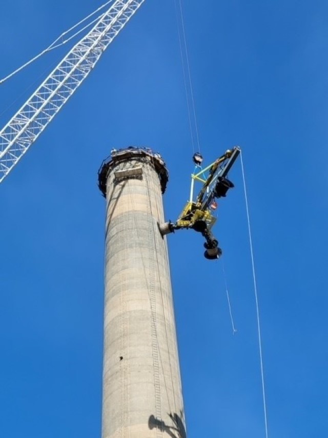 The MANTIS Demolition System being placed on top of the stack at Brookhaven National Laboratory.