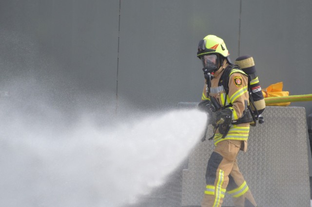 A U.S. Army Garrison Ansbach firefighter practices putting out a fire at the Regional Fire Fighters Training Center on Urlas Kaserne Sept. 24, 2020.  U.S. Army Garrison Ansbach Directorate of Emergency Services firefighters who were selected as...