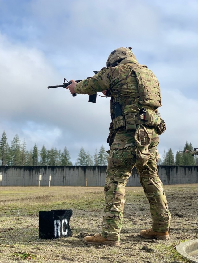 Sgt. Ethan Hopkins, a section leader with 1st Battalion, 501st Parachute Infantry Regiment, 4th Infantry Brigade Combat Team (Airborne), 25th Infantry Division, U.S. Army Alaska, shoots his M4 rifle during I Corps Best Marksmanship Competition at Joint Base Lewis-McChord, Washington, Jan., 26, 2021. Paratroopers took first place as a team during the competition, beating 11 other teams. (U.S. Army photograph by Staff Sgt. Joseph Donoghue)