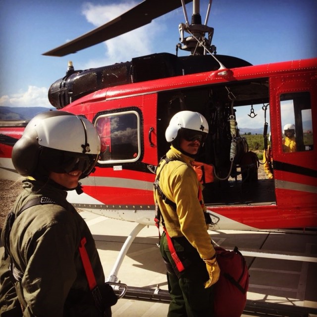 Tessa Morris gets ready to board a helicopter with her instructor just before her first rappel at the National Rappel Academy in Salmon, Idaho.