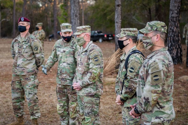 FORT BENNING, Ga. – Command Sgts. Maj. Todd Sims and T.J. Holland, the senior enlisted Soldier for Forces Command and 18th Airborne Corps, respectively, visited Sand Hill, the home of Infantry one-station unit training, to see the First 100 Yards, Jan. 29, 2021. (U.S. Army photo by Patrick A. Albright, Fort Benning Maneuver Center of Excellence photographer)

