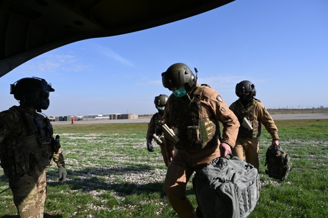 U.S. Soldiers with Task Force Gambler and Italian soldiers with Airmobile Task Group Griffon respond to a downed aircraft scenario during an aerial reaction force exercise. The exercise ensured the coalition partners’ cohesiveness in responding...