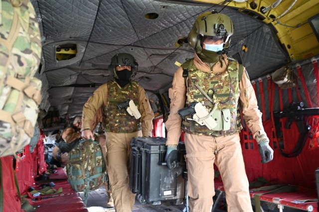 U.S. Soldiers with Task Force Gambler and Italian soldiers with Airmobile Task Group Griffon respond to a downed aircraft scenario during an aerial reaction force exercise. The exercise ensured the coalition partners’ cohesiveness in responding...
