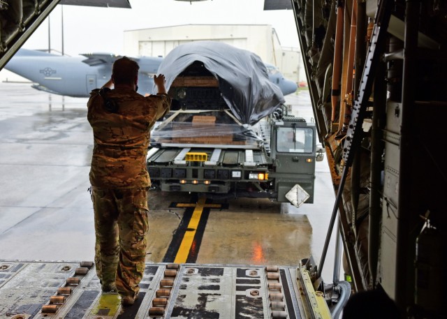U.S. Air Force personnel load heavy drop pallets onto a C-130 aircraft at Joint Base Charleston, S.C., January 31, 2021. (U.S. Air Force Photo) 