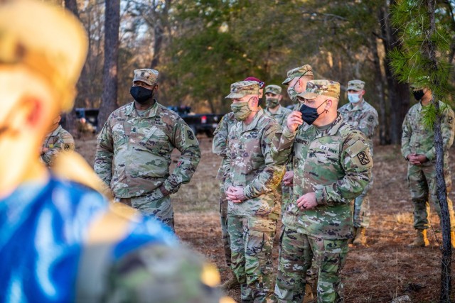 FORT BENNING, Ga. – Command Sgts. Maj. Todd Sims and T.J. Holland, the senior enlisted Soldier for Forces Command and 18th Airborne Corps, respectively, visited Sand Hill, the home of Infantry one-station unit training, to see the First 100...