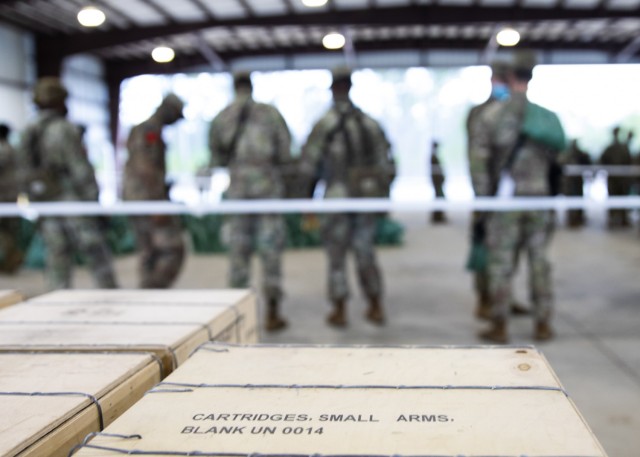 Paratroopers assigned to 3rd Brigade Combat Team, 82nd Airborne Division draw blank ammunition at Fort Bragg, N.C., January 31, 2021. The ammunition is for the brigade&#39;s upcoming Joint Readiness Training Center rotation.