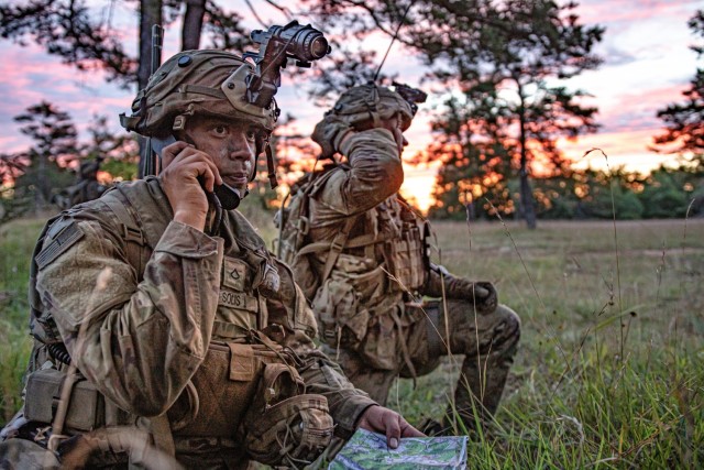 Soldiers assigned to 173rd Airborne Brigade conduct a map check as they approach a town for the final assault in Hohenfels Training Area, Germany, Aug. 20, 2020. The brigade falls under the new U.S. Army Europe and Africa Command after U.S. Army Europe and U.S. Army Africa consolidated in November 2020.
