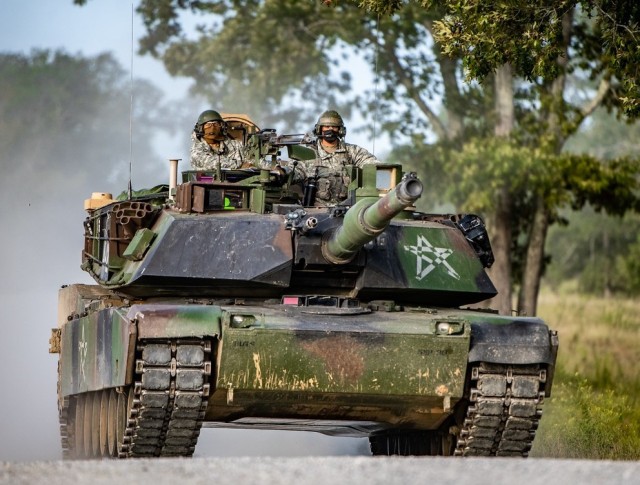 FORT BENNING, Ga. – In a September 2020 photo, an M1 Abrams tank is on the move during a training event at Fort Benning. Training recruits to become crewmen, mechanics and others for service with the Armor force is carried out by the 194th Armored Brigade, part of Fort Benning&#39;s U.S. Army Maneuver Center of Excellence. A drill sergeant in the brigade&#39;s 1st Battalion, 81st Armor Regiment, Staff Sgt. Tamarisk Witherspoon, designed a briefing for her trainees to help ease their transition to their new units once they&#39;ve graduated training, something she said would have been helpful to her when she had reported to her first unit after training. In it she encourages trainees to maintain a bank account and save money, to further their education, and to avoid errors like rushing to buy a car without first checking the reputation of the dealership, and she  offers other practical advice and information about settling in at a new unit.

 (U.S. Army photo by Patrick A. Albright, Maneuver Center of Excellence and Fort Benning Public Affairs)
