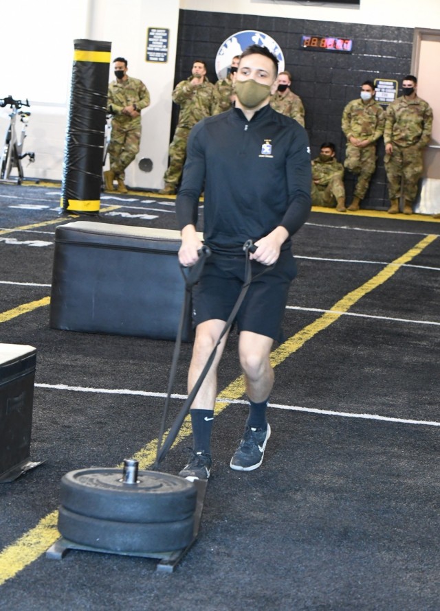 Soldiers race through a 10-obstacle functional fitness challenge Feb. 4 at Atkins Functional Fitness Facility. The event was hosted and organized by AFFF staff, Fort Drum Better Opportunities for Single Soldiers (BOSS) members, and Family and Morale, Welfare and Recreation personnel. (Photo by Mike Strasser, Fort Drum Garrison Public Affairs)