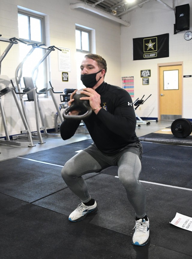 Soldiers race through a 10-obstacle functional fitness challenge Feb. 4 at Atkins Functional Fitness Facility. The event was hosted and organized by AFFF staff, Fort Drum Better Opportunities for Single Soldiers (BOSS) members, and Family and Morale, Welfare and Recreation personnel. (Photo by Mike Strasser, Fort Drum Garrison Public Affairs)