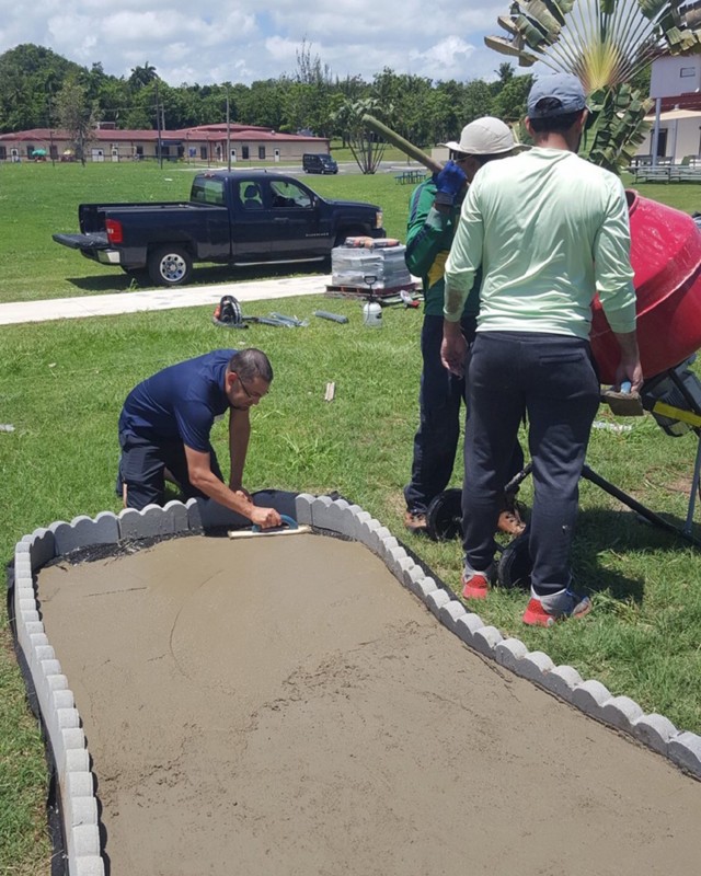 Child and Youth Services Assistant Director, Luis Maldonado also worked on the construction of Fort Buchanan’s nine-hole mini golf course making sure the greens were smooth and level for putting.