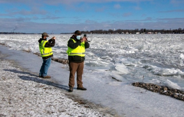 U.S. Army Corps of Engineers, Detroit District, field team Senior Hydraulic Engineer Matt McClerren, left, and Hydraulic Technician Jon DePhillips document St. Clair River ice jams on the St. Clair River at Algonac State Park February 3, 2021....