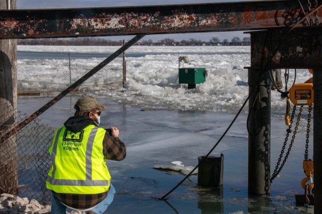 U.S. Army Corps of Engineers, Detroit District, field team member Senior Hydraulic Engineer Matt McClerren documents St. Clair River ice jams and checks on Corps of Engineers gages (green box) on the St. Clair River in Marine City, Michigan,...