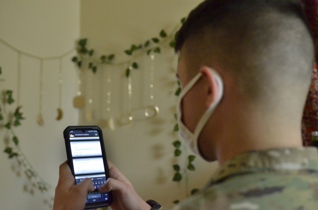 Specialist Daniel Szkolny, 96th Aviation Support Battalion, 101st Combat Aviation Brigade, 101st Airborne Division (Air Assault), recently places a work order through the Army Maintenance Application.