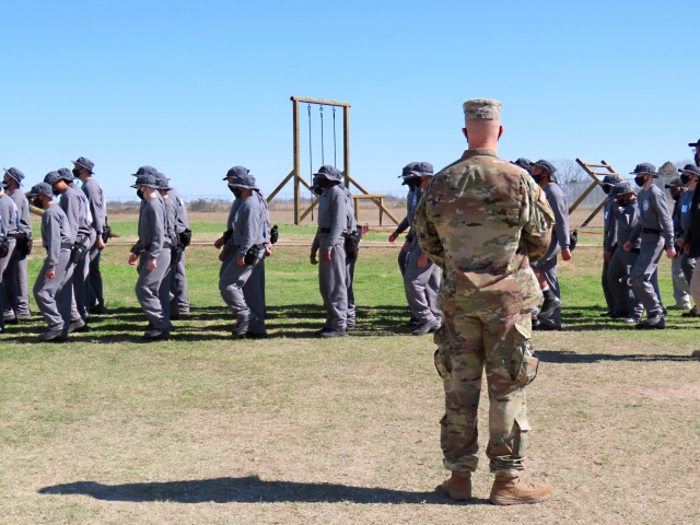 Sgt. Jason Pope inspects drill and ceremony movements during the acclimation phase at the Texas ChalleNGe Academy in Eagle Lake, Texas. The Texas National Guard Joint Counterdrug Task Force has supported the Texas ChalleNGe Academy for more than...