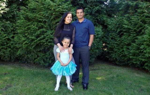 Staff Sgt. Perla Gonzalez and her husband, Sgt. Jose Pantoja, pose for a family photo with their daughter, Yelis. 