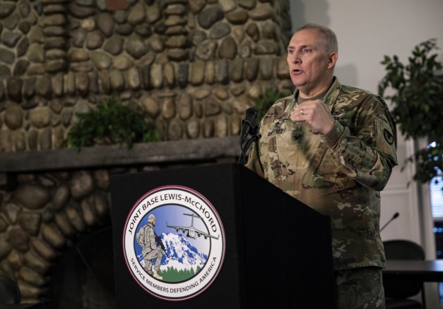 Chaplain (Col.) David Shoffner, the Joint Base Lewis-McChord garrison chaplain, instructs his Wellness Symposium course over Facebook Live from the Family Resource Center on JBLM, Wash., Jan. 27, 2021. Shoffner instructed a class on spiritual wellness, highlighting the impact that having a spiritual connection can have on the wellness of an individual, whether religious or meditative. (U.S. Army photo illustration by Staff Sgt. Kyle Larsen)