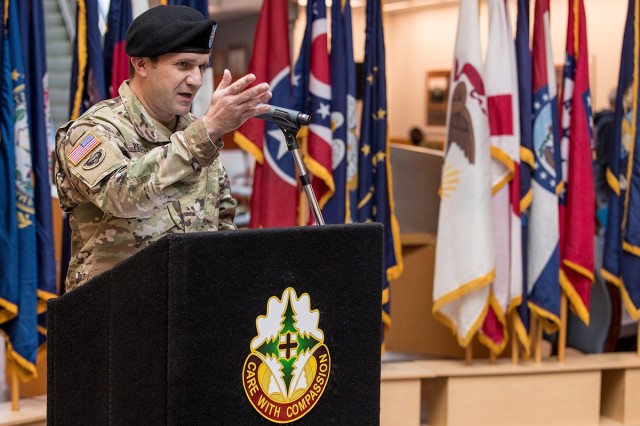 Lt. Col. Woodrow Pengelly addresses a small crowd gathered at Madigan Army Medical Center on Joint Base Lewis-McChord, Wash., for a change of command ceremony where he steps into the commander shoes for the Soldier Recovery Unit on Feb. 3.