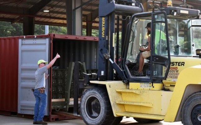 Crane Army Ammunition Activity, a JMC Subordinate installation, loads munitions into containers for distribution to meet soldier requirements.