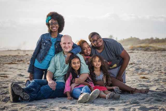 WIESBADEN, Germany -- Jessica Tabbert, administrative officer at USAREUR-AF, grew up in Florida. Husband, Master Sgt. Nathan Tabbert, equal opportunity advisor for the 66th Military Intelligence Brigade, and, their four children (left to right: Olesia, Arianna, Elaina and Ishaiah) enjoy Melbourne Beach in 2017. Photo by Andrew Green of Imani J. Photography.