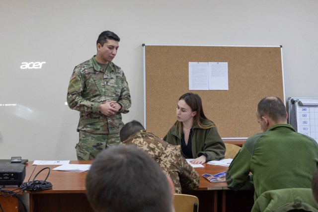 1st Lt. Johnny Vazquez teaches NATO safety standards to Armed Forces of Ukraine Soldiers during their Observer Controller Trainer academy, Feb. 3 at Combat Training Center-Yavoriv. (U.S. Army photo by Cpl. Shaylin Quaid)