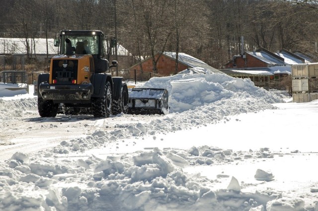A front-end loader is used to clear snow on Picatinny Arsenal during Winter Storm Orlena.