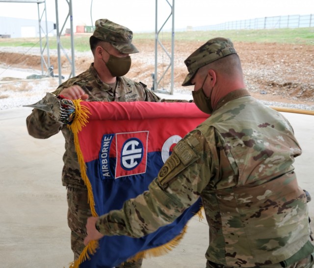 2nd Brigade Combat Team, 82nd Airborne Division's Brigade Commander, Col. Phillip Kiniery III, case the brigade colors signifying the completion of their responsibilities for Combined Joint Task Force - Operation Inherent Resolve during a transfer of authority ceremony at Erbil Air Base, Iraq, Jan. 31, 2021.