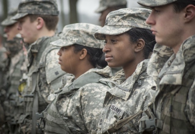 U.S. Army Reserve Officers’ Training Corps cadet Raveen Mooney stands in a formation to witness a contracting ceremony for a fellow cadet on March 3, 2016. 