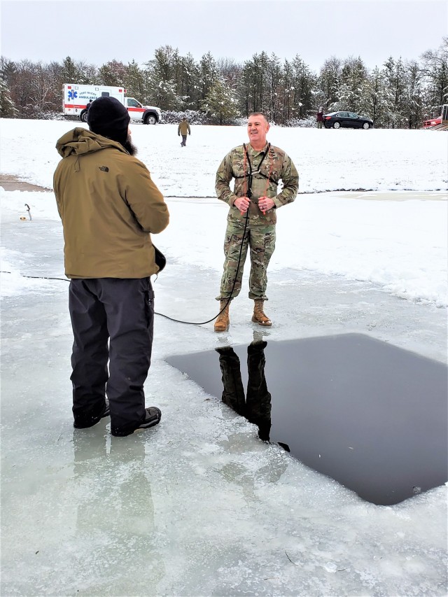 Fort McCoy Garrison Commander Col. Michael D. Poss prepares to participate in a cold-water immersion familiarization event Jan. 15, 2021, at Fort McCoy, Wis. Poss was learning about this training event that is part of the Fort McCoy Cold-Weather...