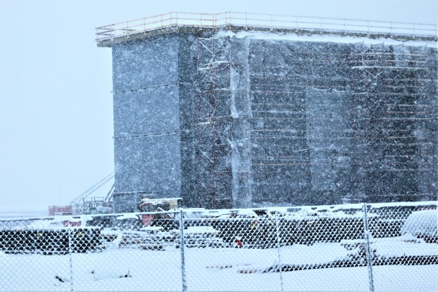 Construction of a new multi-million dollar transient troop training barracks is shown Feb. 4, 2021, at Fort McCoy, Wis. Contractor L.S. Black Constructors was awarded a $20.6 million contract to build the barracks in September 2019. The planned completion date is currently August 2021. The planned barracks will be different than the traditional barracks that are located throughout the installation. This new building is four stories and be able to house 400 people in approximately 60,000 square feet. The project also is the first of eight new buildings planned for the entire 1600 block at Fort McCoy. The plan is to build three more barracks with the same specifications, three 20,000-square-foot brigade headquarters buildings, and one 160-room officer quarters. This is an Army Corps of Engineers-managed project. (U.S. Army Photo by Scott T. Sturkol, Public Affairs Office, Fort McCoy, Wis.)