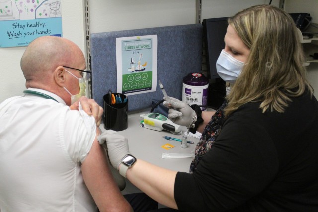 Erica Miller, a registered nurse with the Fort McCoy Health Clinic, prepares a COVID-19 vaccination Jan. 26, 2021, during the first round of COVID-19 vaccinations at Fort McCoy, Wis. Several people received the vaccine at the post Jan. 26. The...