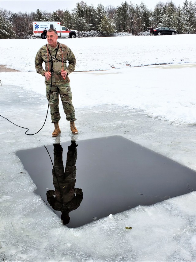 Fort McCoy Garrison Commander Col. Michael D. Poss prepares to participate in a cold-water immersion familiarization event Jan. 15, 2021, at Fort McCoy, Wis. Poss was learning about this training event that is part of the Fort McCoy Cold-Weather...