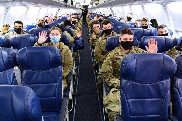 MEDCoE AIT Soldiers wave while onboard a contract airplane at Kelly Field, San Antonio that will take them to their first duty assignment.

U.S. Army Medical Center of Excellence on February 11, 2021 as they conducted a controlled outbound movement from Joint Base San Antonio (JBSA)- Kelly Field for over 250 Soldiers departing Advanced Individual Training (AIT) in various medical military occupational specialties at JBSA on February 11, 2021.

With this move, the medical education and training institution commemorated the 10,000th AIT Soldier moved in this controlled manner as part of their COVID-19 mitigation measures. All outbound Soldiers who depart the relative safety bubble of the training environment are confirmed COVID-negative. The first controlled movement was nine months ago on April 7, 2020.
