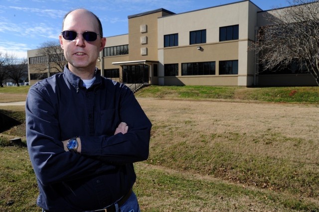 Steven Courter, a mechanical engineer, poses in front of building 3305 on Friday, Jan. 29, 2021 on Redstone Arsenal, Ala.